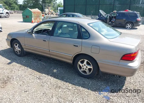 1999 Toyota Avalon Xls z USA, uszkodzony, nr VIN 4T1BF18B2XU322737